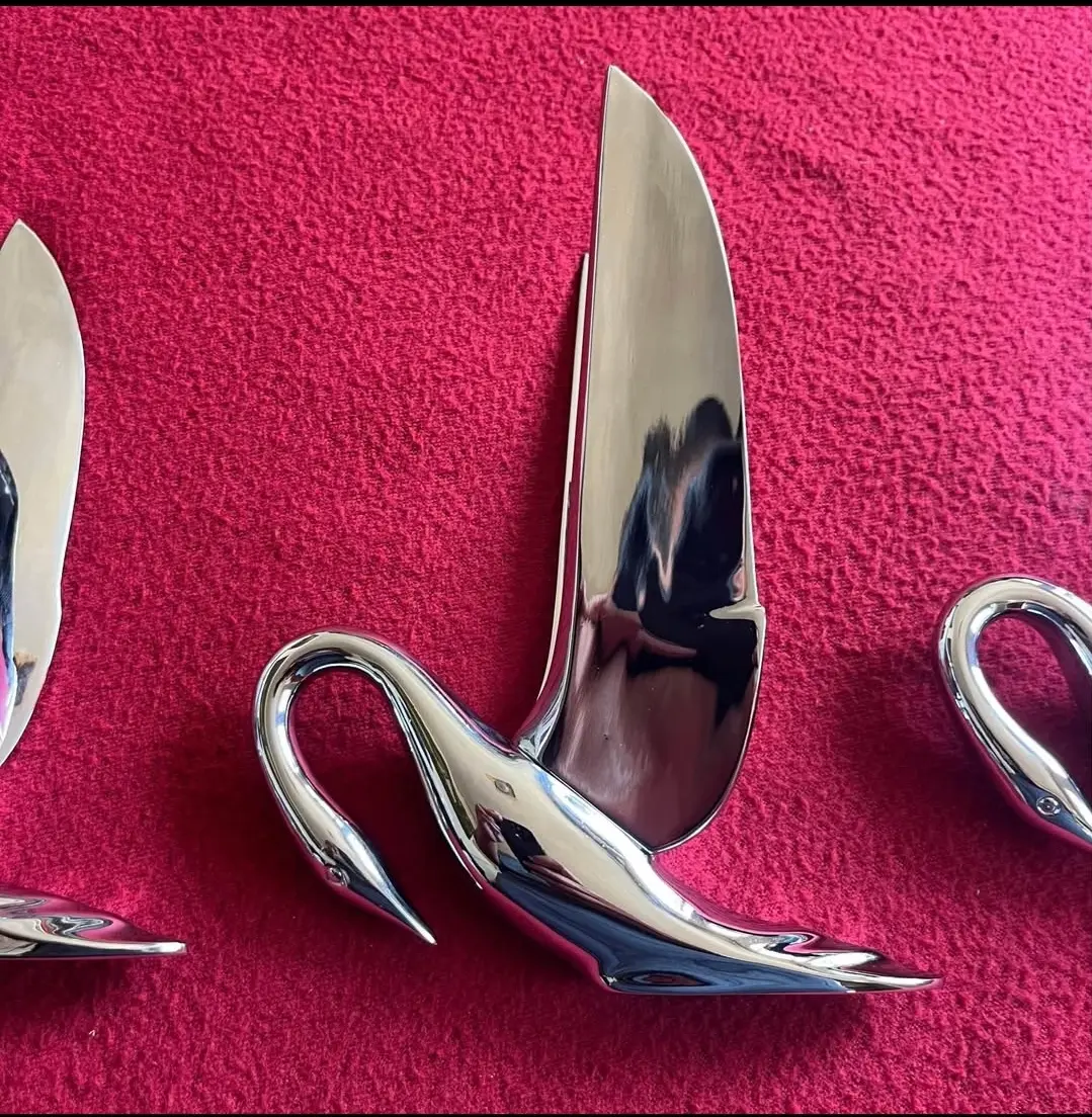 Original 1950s Packard swan hood ornaments.